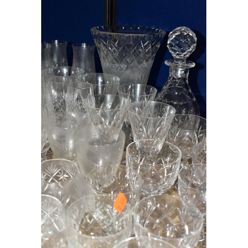 414 - A QUANTITY OF CUT CRYSTAL AND GLASSWARES, comprising a Waterford Lismore pattern ship's decanter, a ... 