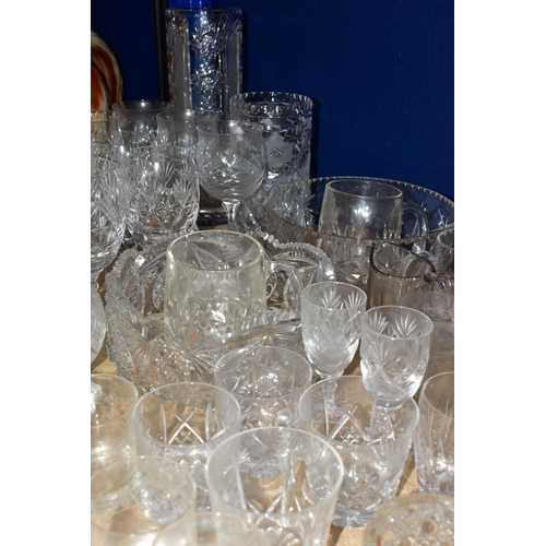 414 - A QUANTITY OF CUT CRYSTAL AND GLASSWARES, comprising a Waterford Lismore pattern ship's decanter, a ... 