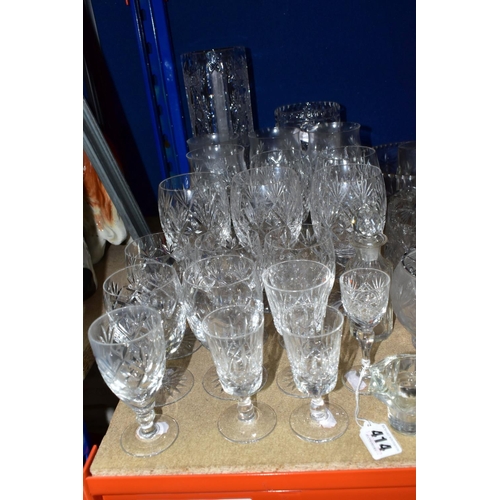 414 - A QUANTITY OF CUT CRYSTAL AND GLASSWARES, comprising a Waterford Lismore pattern ship's decanter, a ... 