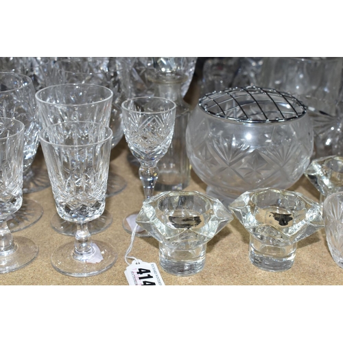 414 - A QUANTITY OF CUT CRYSTAL AND GLASSWARES, comprising a Waterford Lismore pattern ship's decanter, a ... 