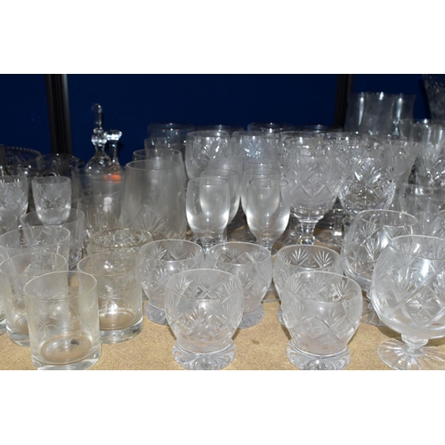 414 - A QUANTITY OF CUT CRYSTAL AND GLASSWARES, comprising a Waterford Lismore pattern ship's decanter, a ... 