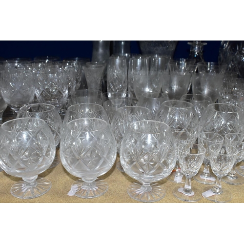 414 - A QUANTITY OF CUT CRYSTAL AND GLASSWARES, comprising a Waterford Lismore pattern ship's decanter, a ... 