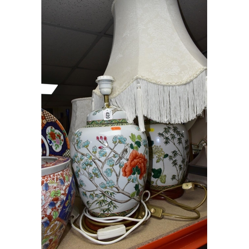 420 - A PAIR OF LARGE ORIENTAL TABLE LAMPS, of sealed ginger jar form, painted with birds and foliage, eac... 