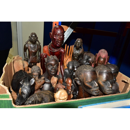 427 - A BOX OF WOODEN TOURIST TRIBAL ITEMS, to include mainly busts and figures of men and women, tallest ... 