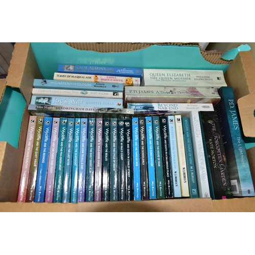 438 - BOOKS, five boxes containing approximately 130 titles, in paperback and hardback formats and featuri... 