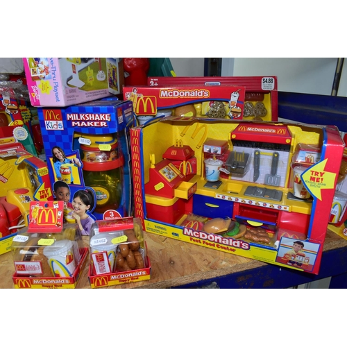 447 - A QUANTITY OF MCDONALDS BOXED PLAY SETS, A BAG OF WRAPPERS, COCA COLA GLASSES, ETC, including Happy ... 