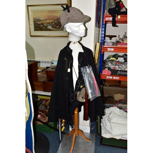 478 - POLICE INTEREST: A POLICE OFFICER'S CAPE, A STRAITJACKET AND OTHER ITEMS OF CLOTHING WITH MANNEQUIN,... 