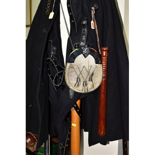 478 - POLICE INTEREST: A POLICE OFFICER'S CAPE, A STRAITJACKET AND OTHER ITEMS OF CLOTHING WITH MANNEQUIN,... 