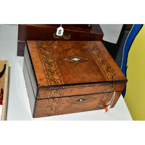 482 - A REGENCY ROSEWOOD TEA CADDY AND TWO WRITING SLOPES, the tea caddy of sarcophagus form supported on ... 