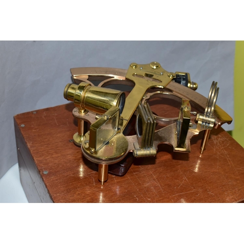 483 - A CASED HEATH & CO 'HEZZANITH' BRASS AND COPPER SEXTANT, with Bakelite handgrip, the case having an ... 