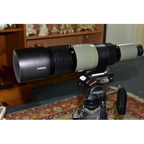 502 - A TAMRON SPOTTING SCOPE AND A TRIPOD, the scope marked 'Zoom 20x-60x' mounted on an adjustable tripo... 