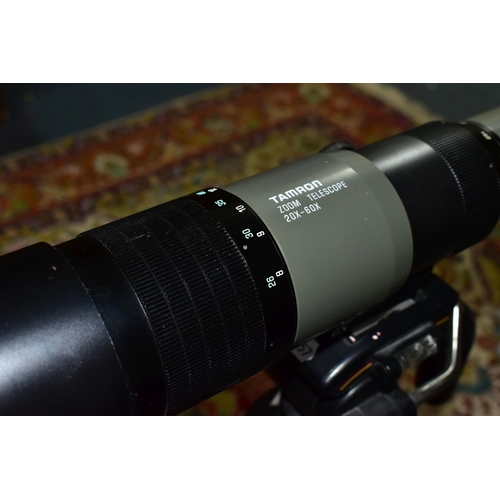 502 - A TAMRON SPOTTING SCOPE AND A TRIPOD, the scope marked 'Zoom 20x-60x' mounted on an adjustable tripo... 