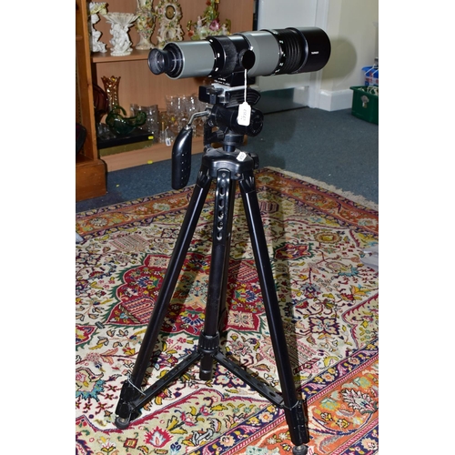 502 - A TAMRON SPOTTING SCOPE AND A TRIPOD, the scope marked 'Zoom 20x-60x' mounted on an adjustable tripo... 