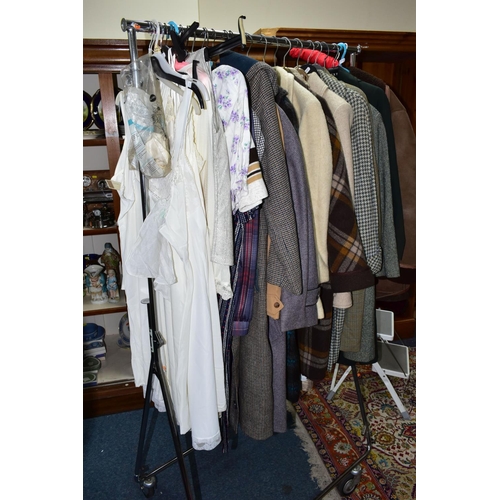 503 - A QUANTITY OF VINTAGE LADIES' CLOTHING, to include twelve coats, mainly thick woollen examples, a sh... 