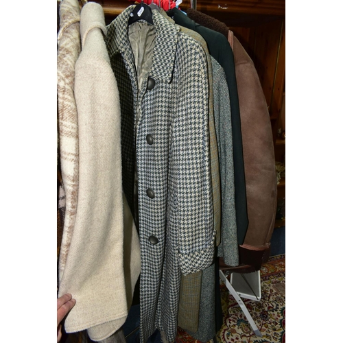 503 - A QUANTITY OF VINTAGE LADIES' CLOTHING, to include twelve coats, mainly thick woollen examples, a sh... 