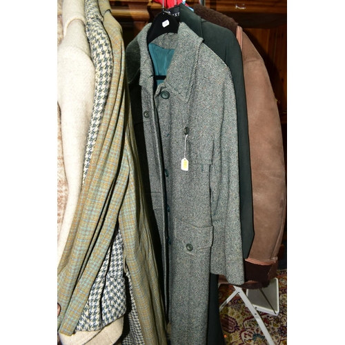 503 - A QUANTITY OF VINTAGE LADIES' CLOTHING, to include twelve coats, mainly thick woollen examples, a sh... 