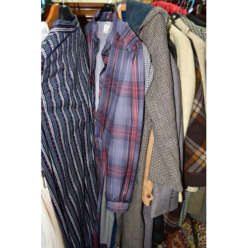 503 - A QUANTITY OF VINTAGE LADIES' CLOTHING, to include twelve coats, mainly thick woollen examples, a sh... 