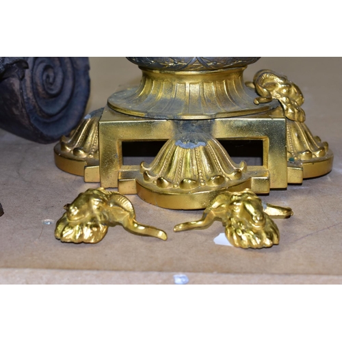 504 - A DECORATIVE ELECTRIC TABLE LAMP IN THE FORM OF AN OIL LAMP, comprising a cast brass base, reservoir... 