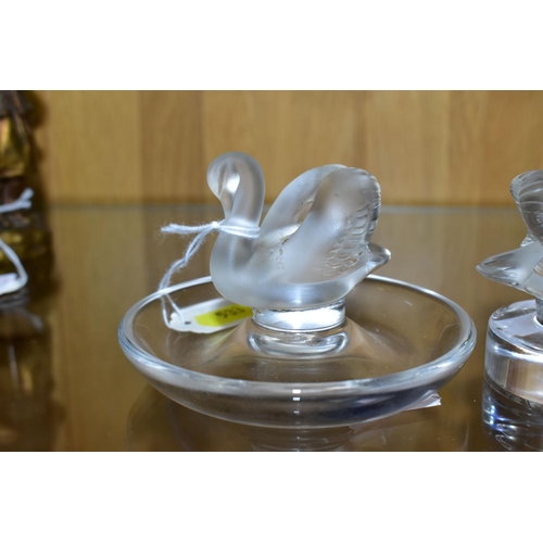 533 - TWO LALIQUE RING / PIN TRAYS AND A LALIQUE PAPERWEIGHT, the two clear glass ring trays with a froste... 