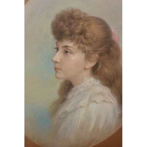 541 - AN EDWARDIAN HEAD AND SHOULDERS PORTRAIT OF A FEMALE FIGURE, unsigned pastel on paper laid onto canv... 