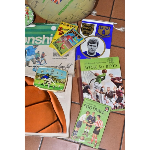 557 - VINTAGE FOOTBALL MEMORABILIA comprising one League Championship Game endorsed by George Best, one Da... 