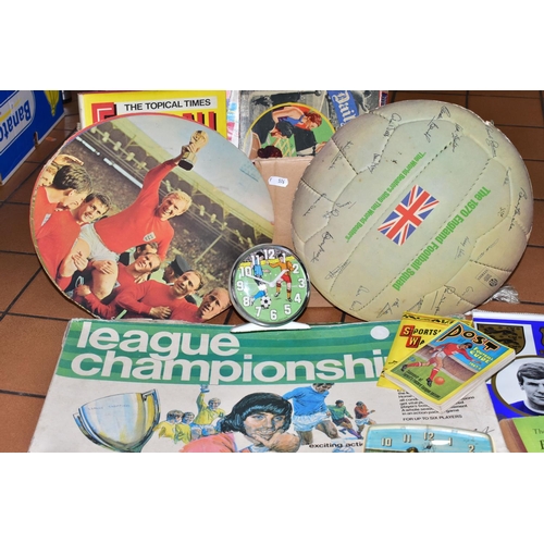 557 - VINTAGE FOOTBALL MEMORABILIA comprising one League Championship Game endorsed by George Best, one Da... 