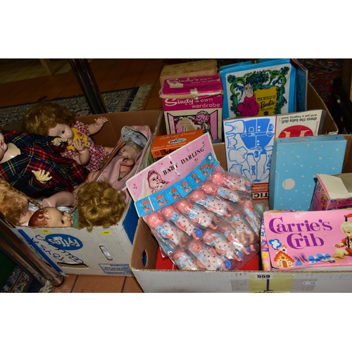 559 - A QUANTITY OF ASSORTED VINTAGE DOLLS AND ACCESSORIES ETC., to include part used Sindy In Town cut-ou... 