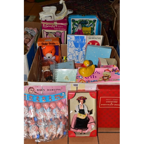 559 - A QUANTITY OF ASSORTED VINTAGE DOLLS AND ACCESSORIES ETC., to include part used Sindy In Town cut-ou... 