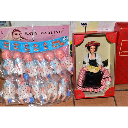 559 - A QUANTITY OF ASSORTED VINTAGE DOLLS AND ACCESSORIES ETC., to include part used Sindy In Town cut-ou... 