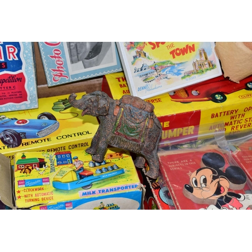 561 - A QUANTITY OF VINTAGE TOYS AND GAMES, to include boxed Hong Kong made plastic battery operated Merce... 