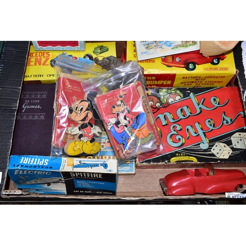 561 - A QUANTITY OF VINTAGE TOYS AND GAMES, to include boxed Hong Kong made plastic battery operated Merce... 