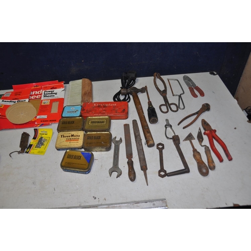 1080 - A BAG CONTAINING A VARIETY OF TOOLS, including hammers, trowels, pliers, etc., various sized sanding... 