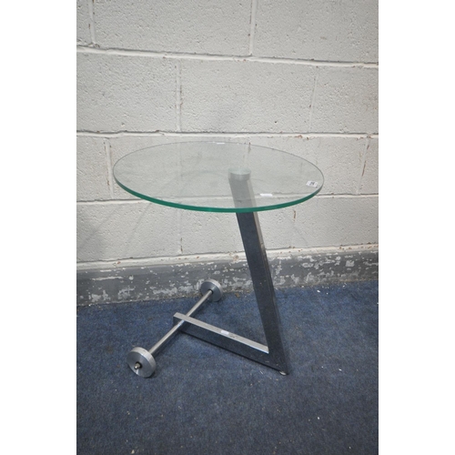 1316 - A CIRCULAR GLASS TOP SIDE TABLE, on a L shaped chrome base with wheels, diameter 51cm x height 59cm ... 