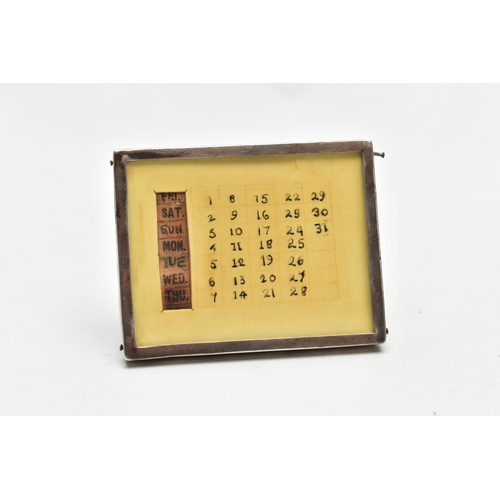 103 - A BOX OF ASSORTED ITEMS, to include an early 20th century silver framed perpetual calendar by 'Sande... 