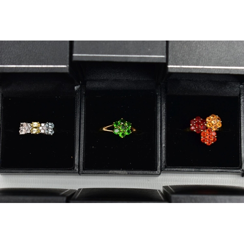 100 - ASSORTED GEM SET RINGS, twenty one colourful gem set dress rings all set in white and yellow metal, ... 