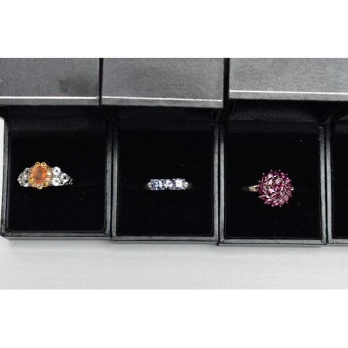 100 - ASSORTED GEM SET RINGS, twenty one colourful gem set dress rings all set in white and yellow metal, ... 