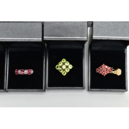 100 - ASSORTED GEM SET RINGS, twenty one colourful gem set dress rings all set in white and yellow metal, ... 