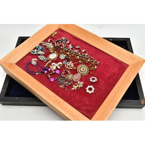 134 - THREE WOODEN DISPLAY TRAYS AND COSTUME JEWELLERY, to include a black rectangular tray with a navy in... 