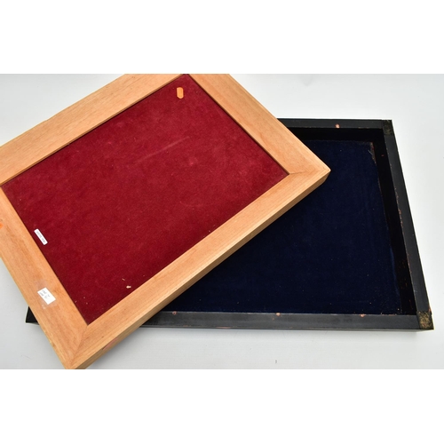 134 - THREE WOODEN DISPLAY TRAYS AND COSTUME JEWELLERY, to include a black rectangular tray with a navy in... 