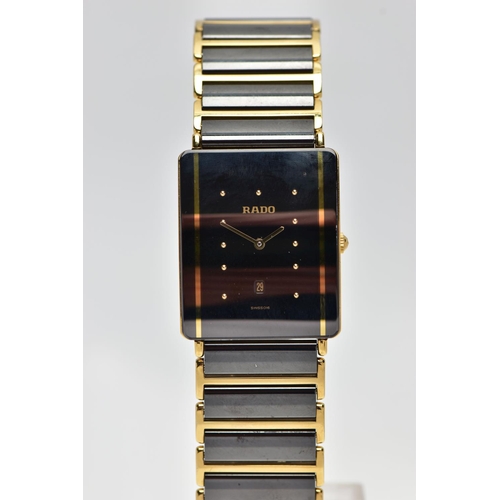 22 - A RADO BLACK CERAMIC 'DIASTAR' QUARTZ WRISTWATCH WITH DATE, the black dial with gold tone hourly app... 