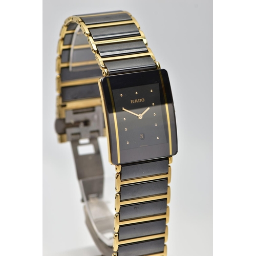 22 - A RADO BLACK CERAMIC 'DIASTAR' QUARTZ WRISTWATCH WITH DATE, the black dial with gold tone hourly app... 