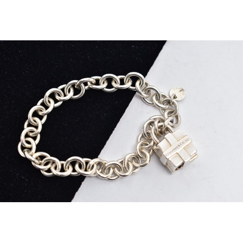 24 - A 'TIFFANY & CO' BRACELET WITH PADLOCK CLASP, curb link bracelet fitted with a circular tag signed '... 