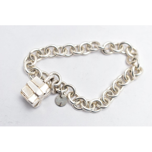 24 - A 'TIFFANY & CO' BRACELET WITH PADLOCK CLASP, curb link bracelet fitted with a circular tag signed '... 