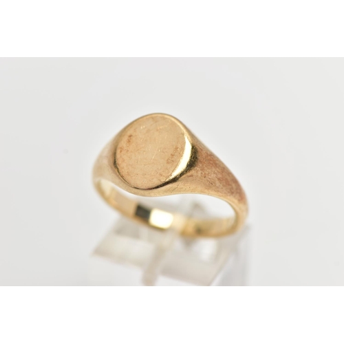 27 - A 9CT GOLD SIGNET RING, yellow gold oval signet ring, approximate width 13mm, hallmarked 9ct Birming... 