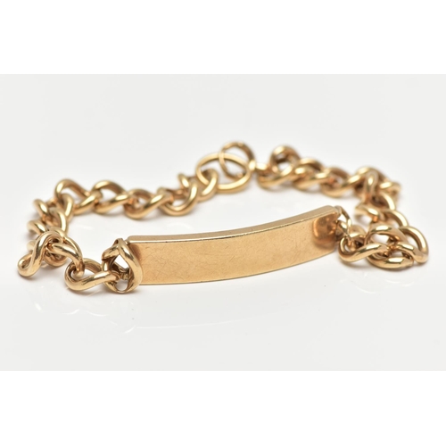 28 - A LARGE 9CT IDENTIFICATION BRACELET, a curb link chain fitted with a solid gold panel, fitted with a... 