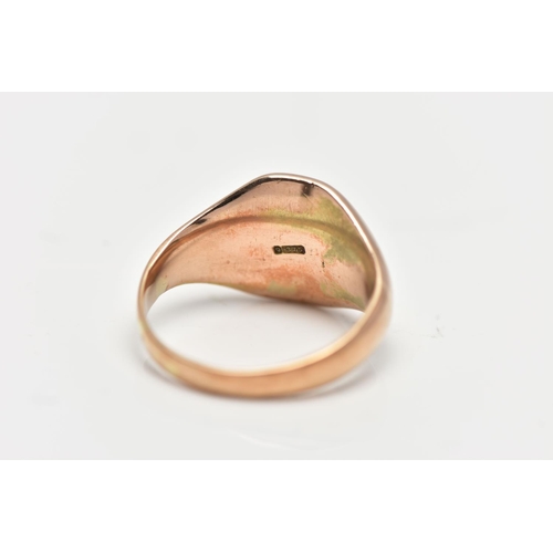 29 - AN EARLY 20TH CENTURY 9CT GOLD SIGNET RING, yellow gold oval signet ring, approximate width 11mm, ha... 