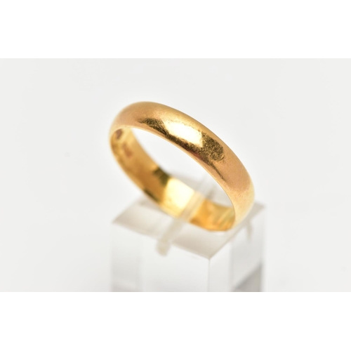 31 - A LARGE 22CT GOLD BAND RING, a courted band ring, approximate width 5.5mm, hallmarked 22ct Birmingha... 