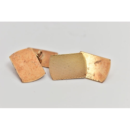 32 - A PAIR OF 9CT GOLD CUFFLINKS, each of a curved rectangular form, with an engine turned pattern and c... 