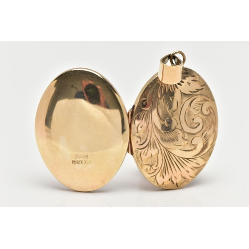 33 - A 9CT GOLD LOCKET PENDANT, a large oval locket, engraved with foliage detail, fitted with a large ta... 