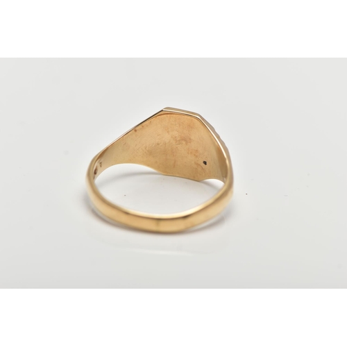 34 - A 9CT GOLD SIGNET RING, yellow gold signet ring, engraved with a scrolling design and textured shoul... 